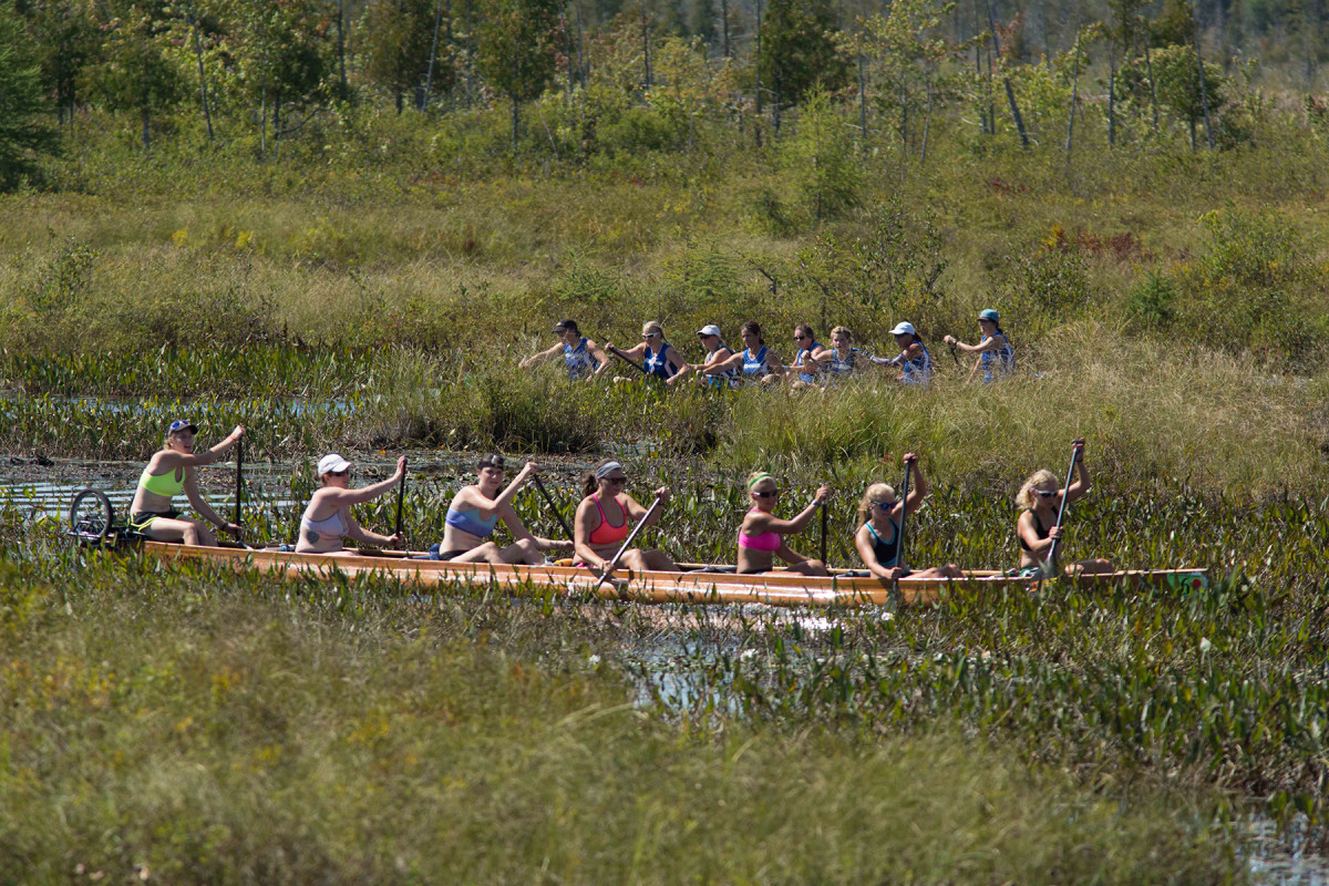 Paddlers race in the 3-day, 90-mile Adirondack Canoe Classic from Old Forge to Saranac Lake in New York state on Friday, September 11.