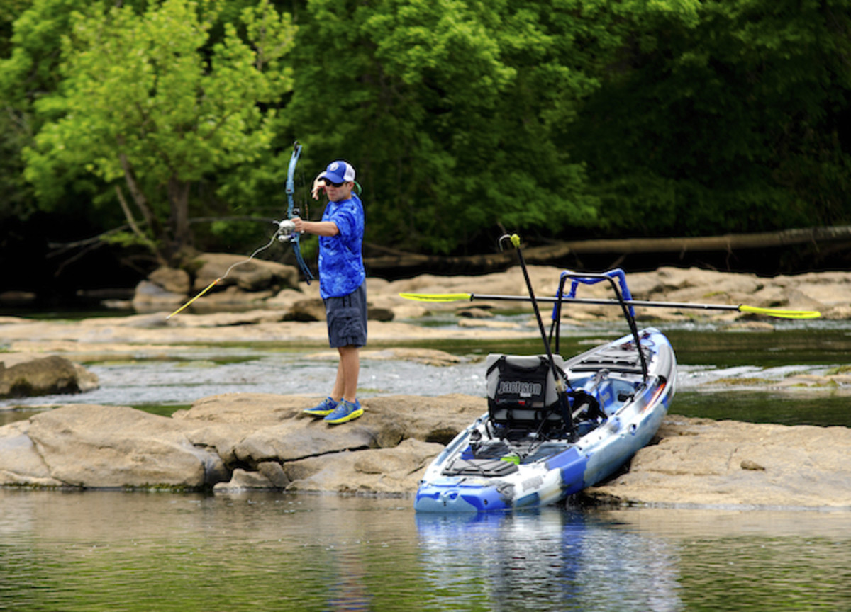 Ethan Funk shooting gar on the Chattahoochee River. Photo by Chris Funk.