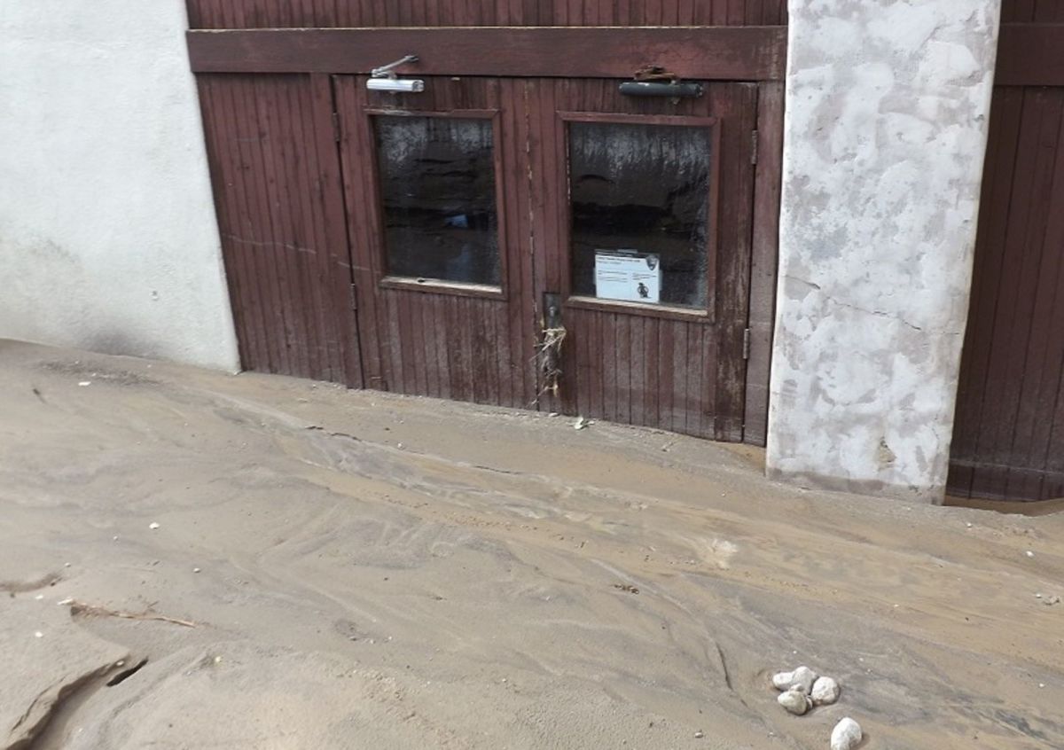 Mud nearly reached the door handles of the visitor's center of Scotty's Castle