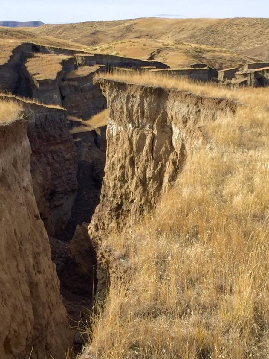 A spring is said to have caused the "slow-moving" landslide in the Bighorn Mountains.