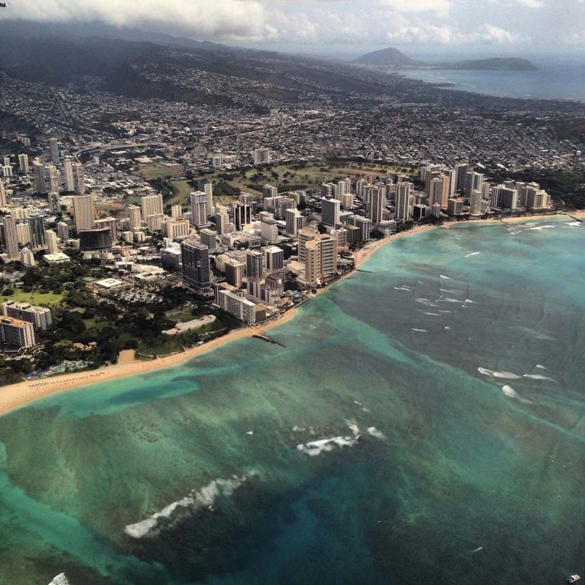 Honolulu, where the city meets the sea. Photo by Twenty20 / amber collett