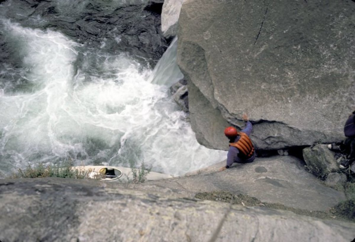 "Here was a choice of carrying a long way downstream or throwing the kayaks in and jumping after them. We chose the latter." -- Reg Lake, San Joaquin River, 1980.