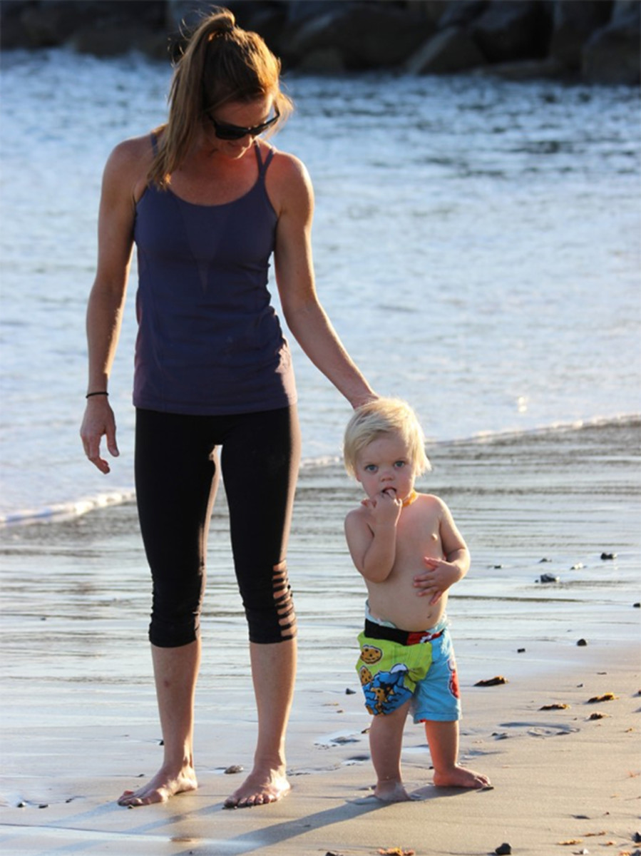 Jaime with her son Ollie at the playground they know best. Something tells us this little grom is going to do big things in SUP someday.