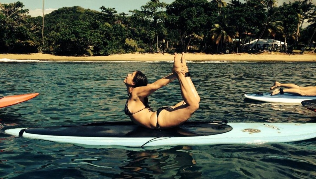 SUP, yoga and sunshine. What more could you ask of a wintertime escape? Photo courtesy of Bikram Retreats Facebook