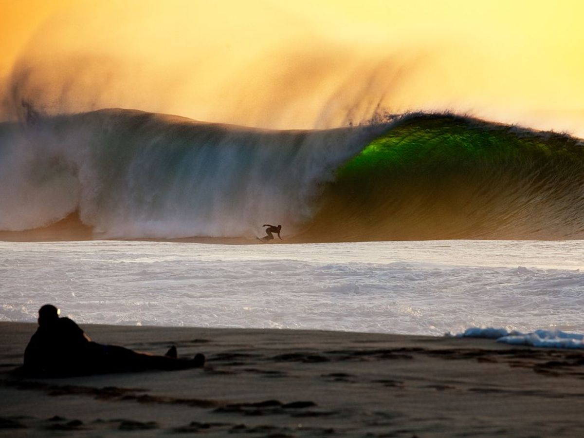 Hawaii's Pipeline is always beautiful, but there's something about sunset. Photo: Courtesy of National Geographic