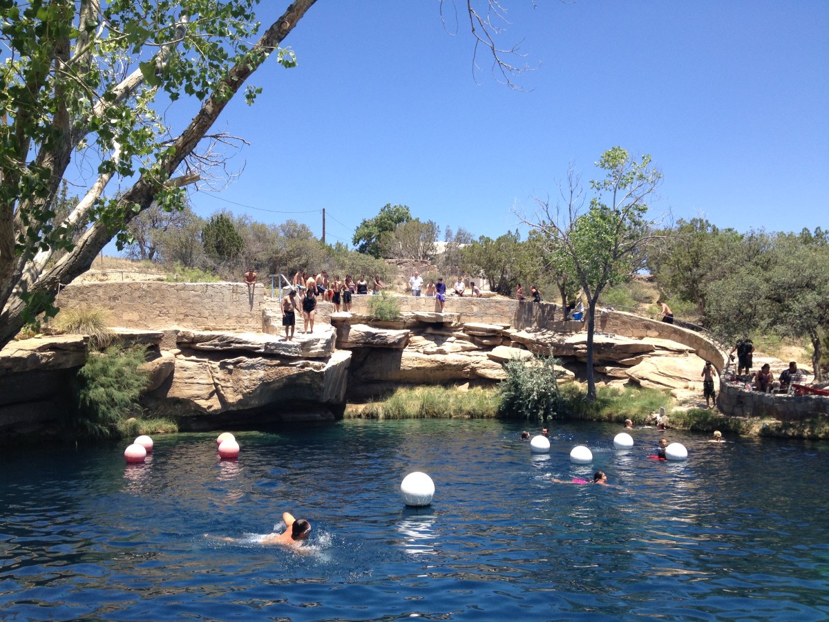 The Blue Hole is a popular swimming and diving destination featuring clear blue water