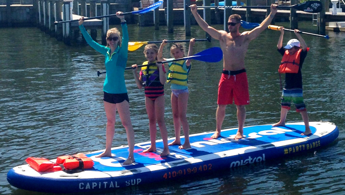 The Capital SUP family, living large and standing strong after a healthy midweek meal. Photo courtesy Capital SUP, Facebook