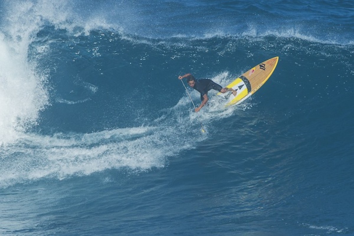 Kai Lenny paddle-surfs at Jaws, off Maui, Hawaii. Photo: Courtesy of Red Bull