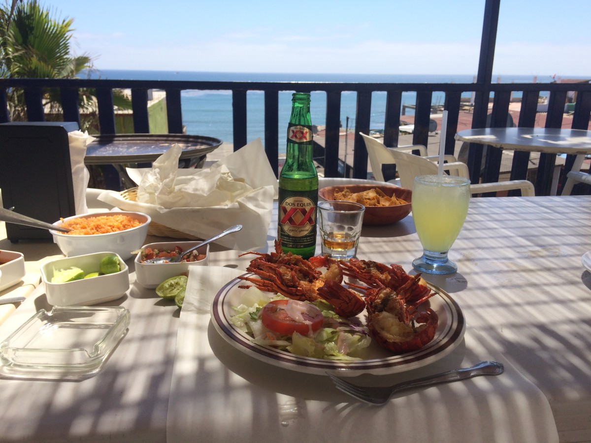 Lobster, cervezas and tequila with a view. Photo: Courtesy of Cyrus Saatsaz