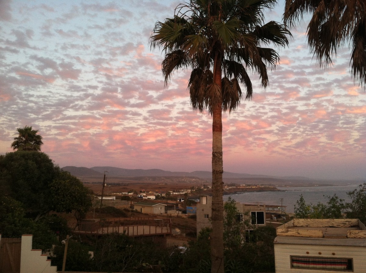 Looking south from Coyote Cal's provides this beautiful view of the sun setting on Eréndira. Photo: Courtesy of Cyrus Saatsaz