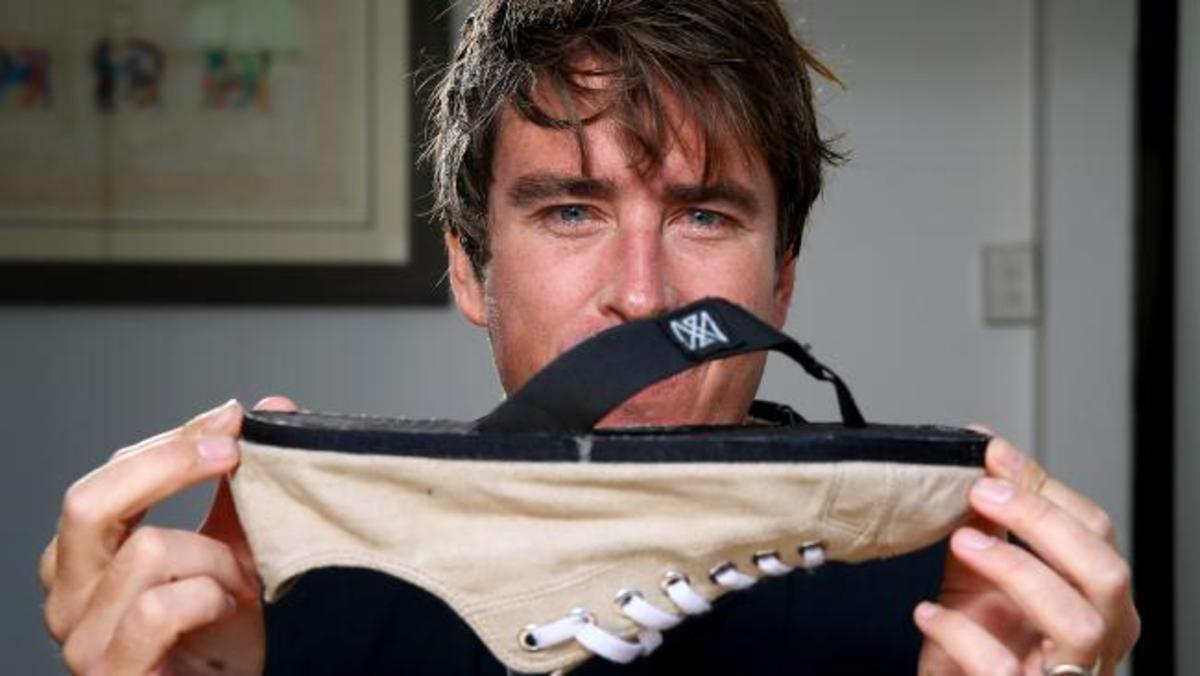 Gillett and his 2 Shu. Photo by Channel 10.