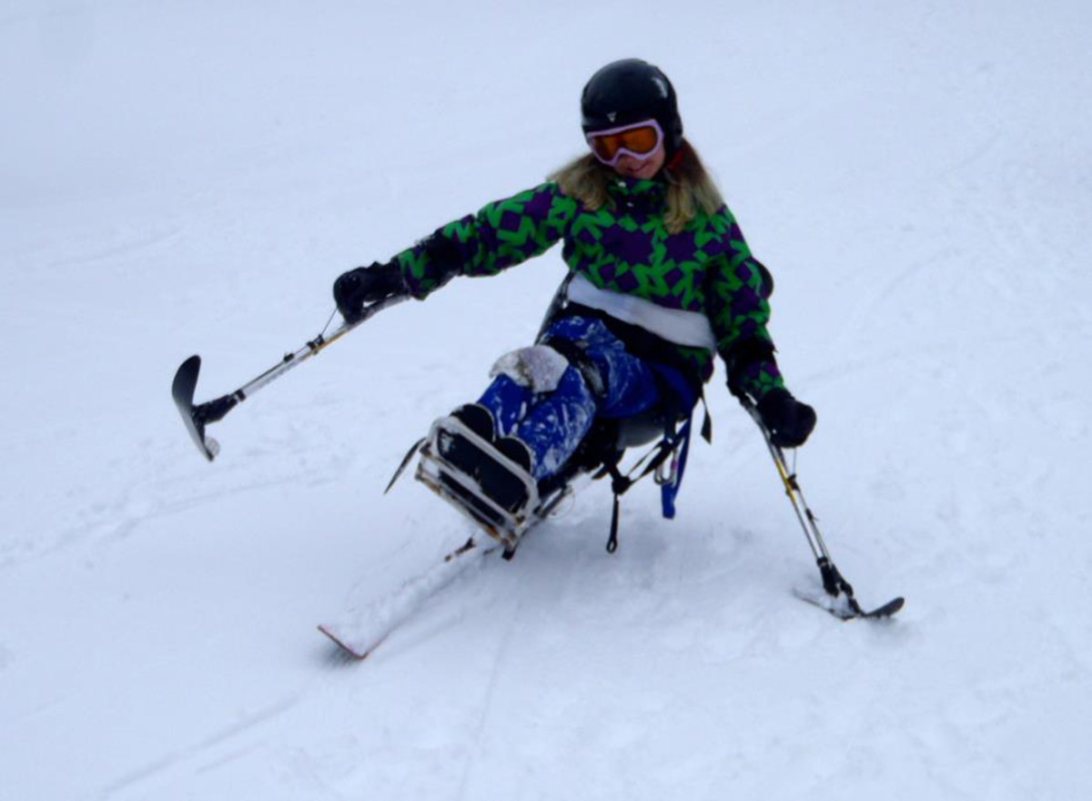 In addition to climbing and mountain triking, May loves sit-skiing. Photo: Courtesy of May
