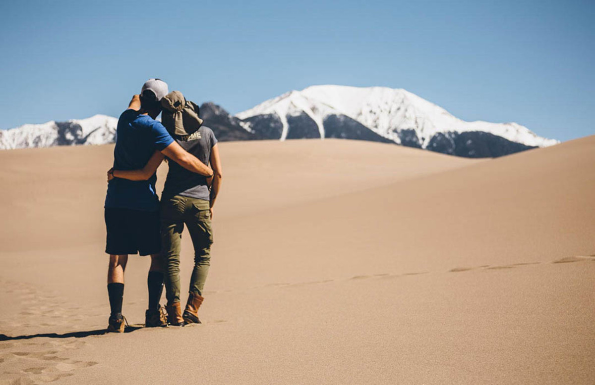 Karla and Andres gathering inspiration for their Great Sand Dunes National Preserve poster. Tough day at work, huh? Photo: Courtesy of Hike and Draw