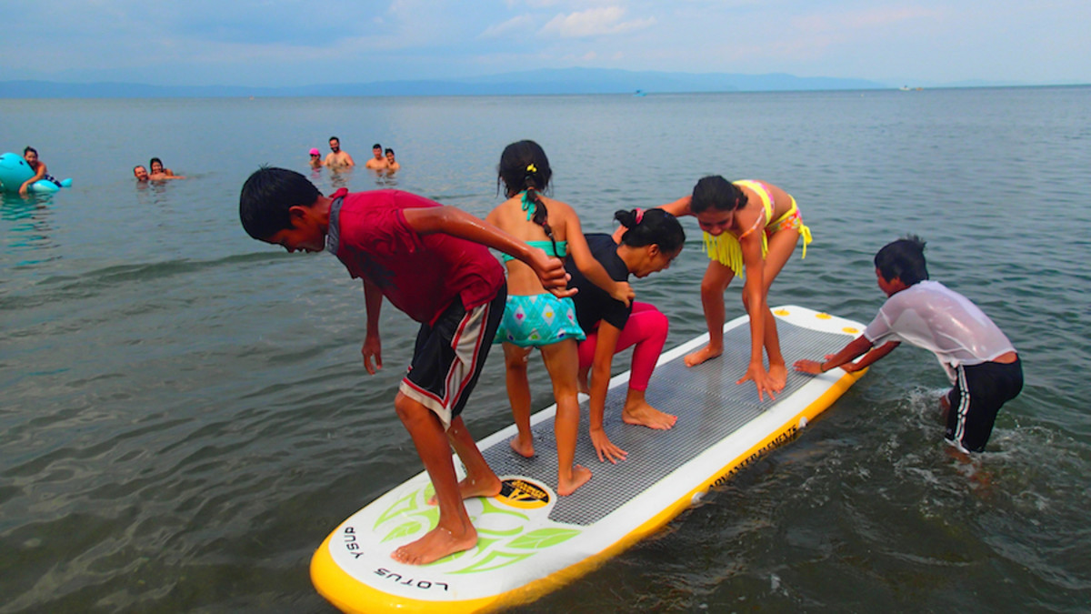 The inflatable SUPs were a hit with the Tico kids.