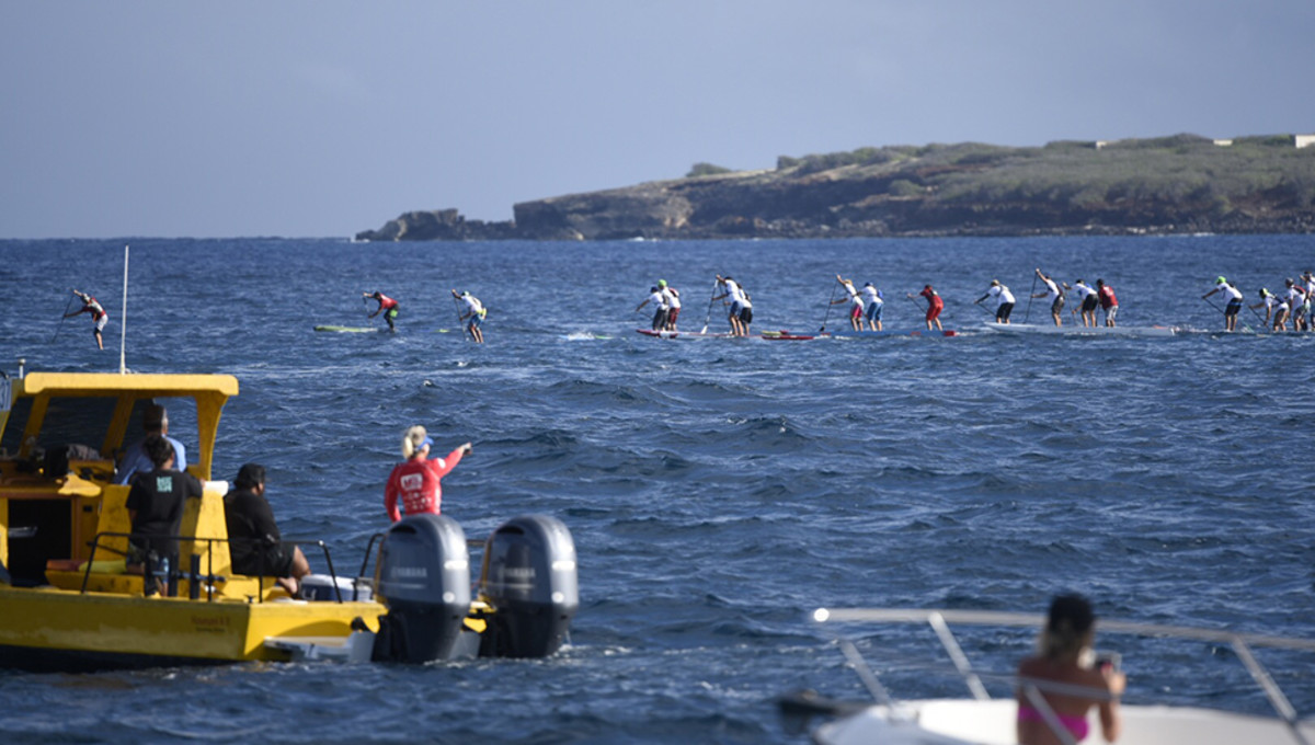 Contenders hammer into the Channel of Bones celebrating two decades of the Molokai 2 Oahu World Championships. Photo: Aaron Black-Schmidt
