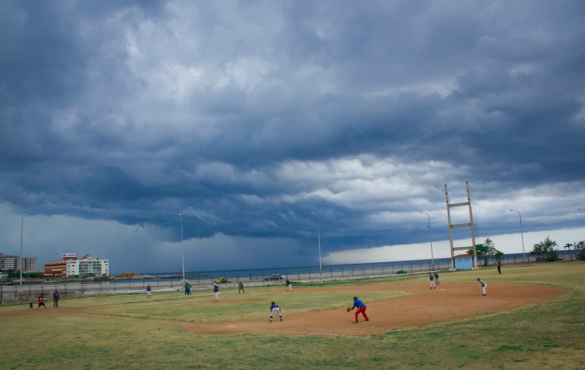 It's not hard to find a baseball game in Cuba, even when the weather rolls in. Photo courtesy of Kade Krichko.