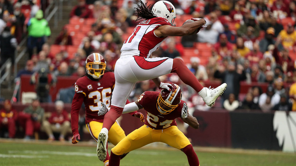 Wide Receiver Larry Fitzgerald #11 of the Arizona Cardinals makes a play in an NFL game.