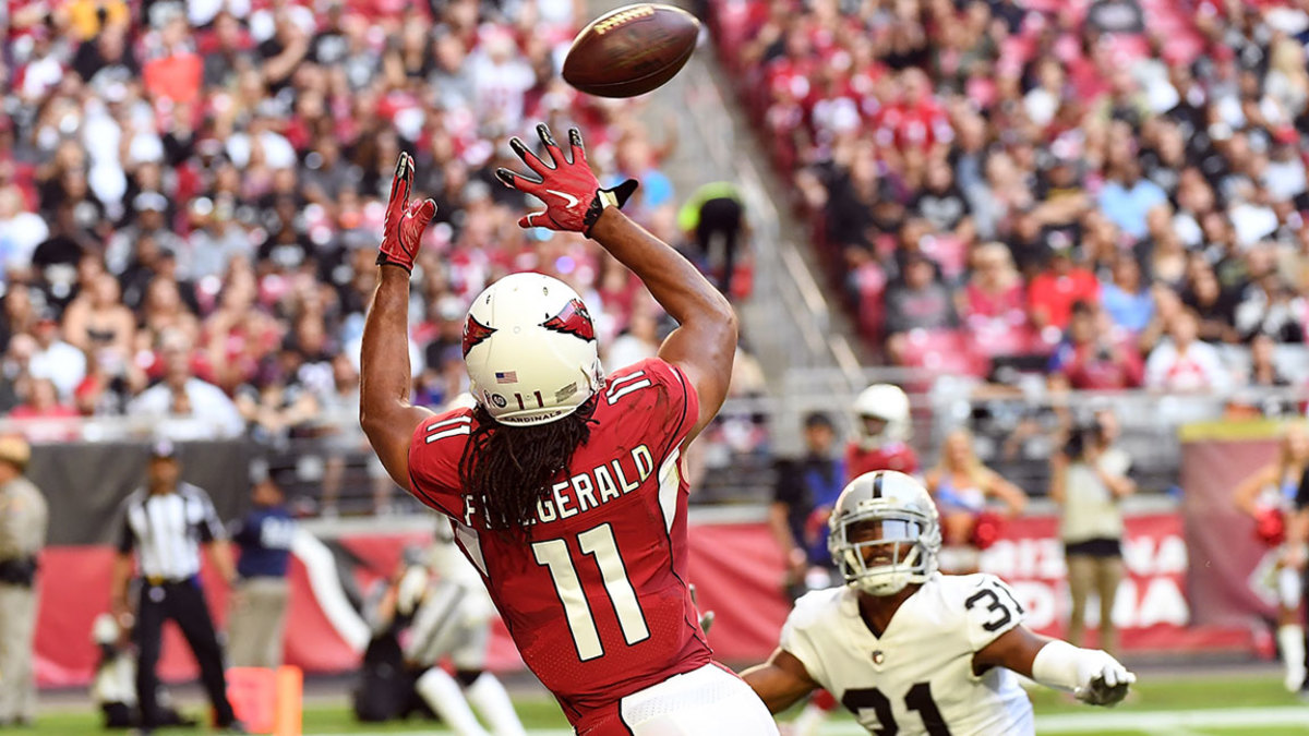 Wide Receiver Larry Fitzgerald #11 of the Arizona Cardinals makes a play in an NFL game.