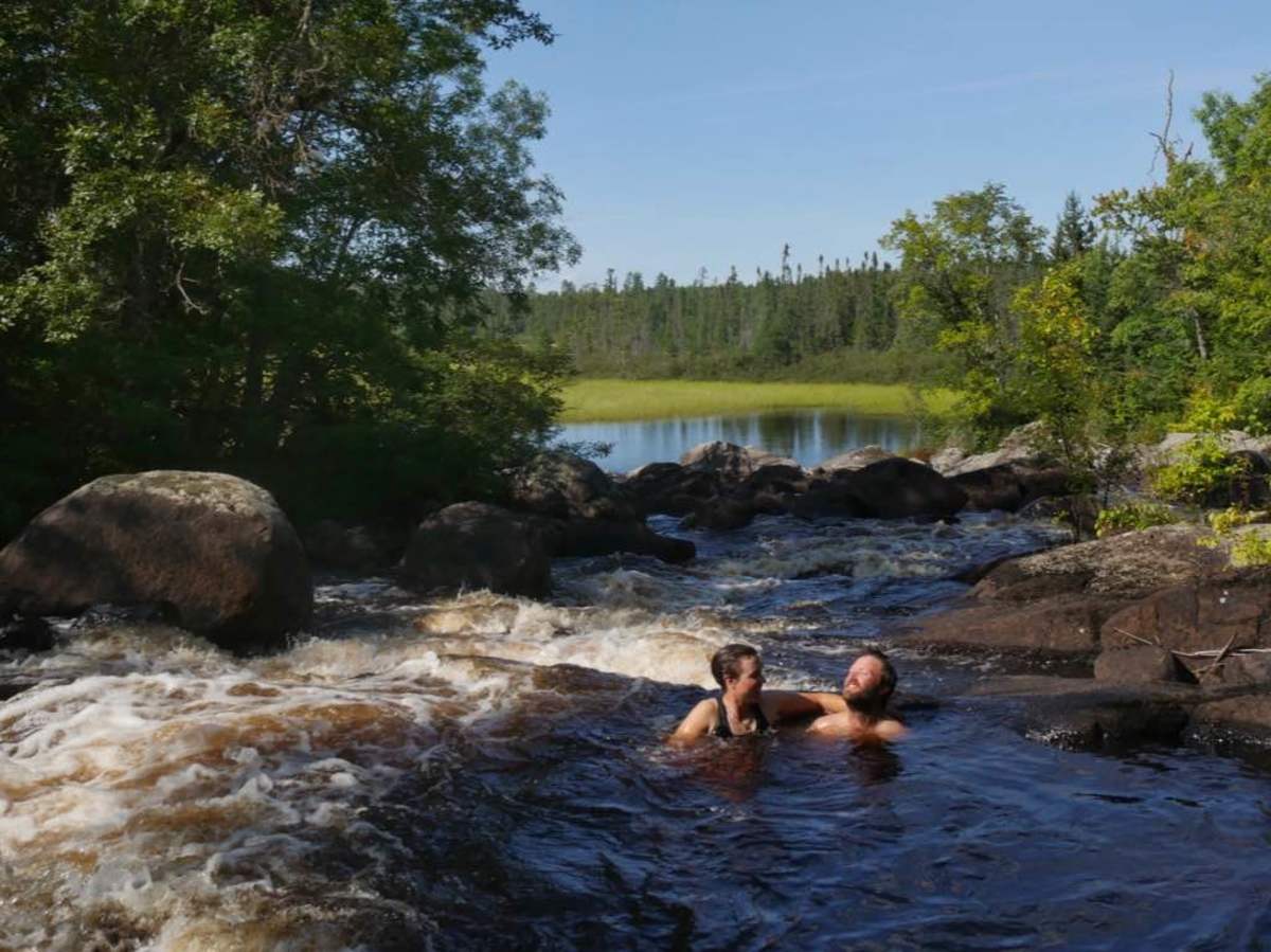 Relaxing in the jacuzzi in the rapids just upstream of the wild rice.
