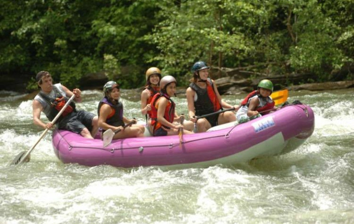 Lewis takes his family rafting on the Ocoee River in Tennessee.