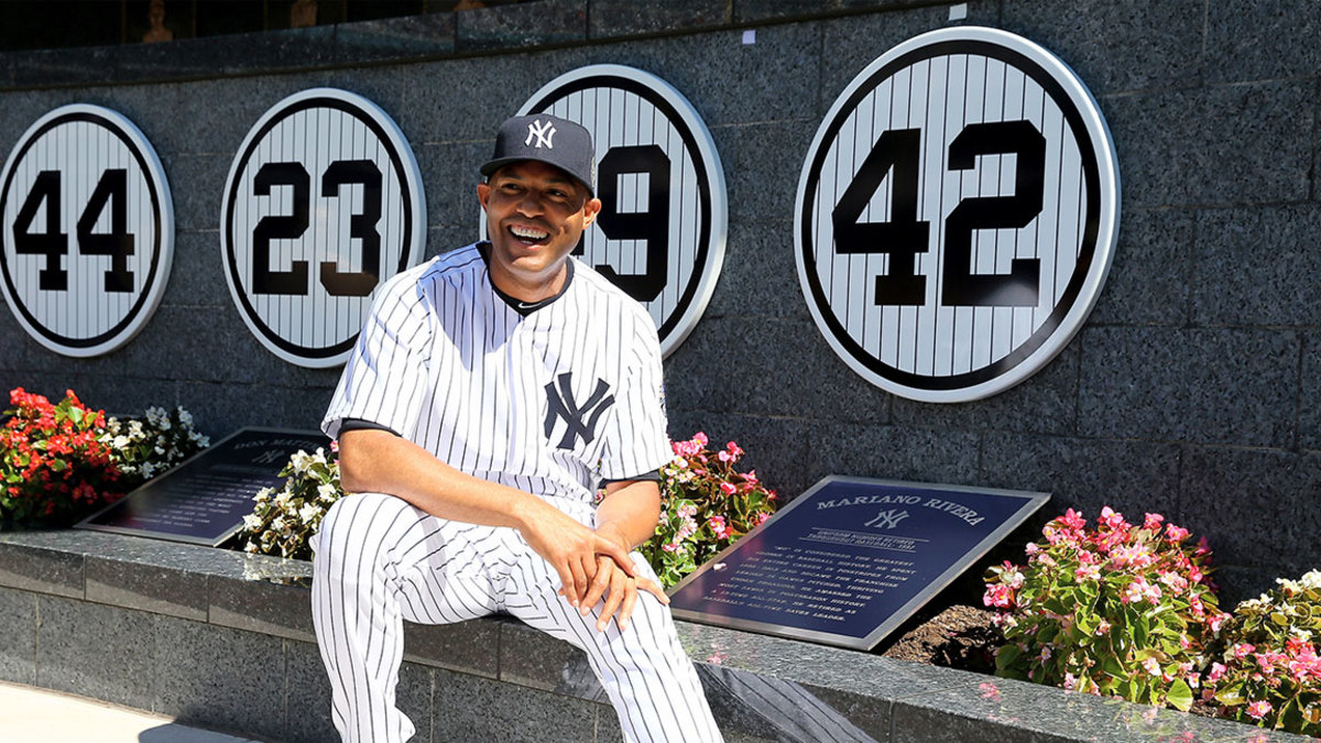Mariano Rivera #42 of the New York Yankees poses next to his retired number in Monument Park before the interleague game against the San Francisco Giants on September 22, 2013 at Yankee Stadium in the Bronx borough of New York City. Rivera was honored by the New York Yankees today with Mariano Rivera Day. (Photo by Elsa/Getty Images)