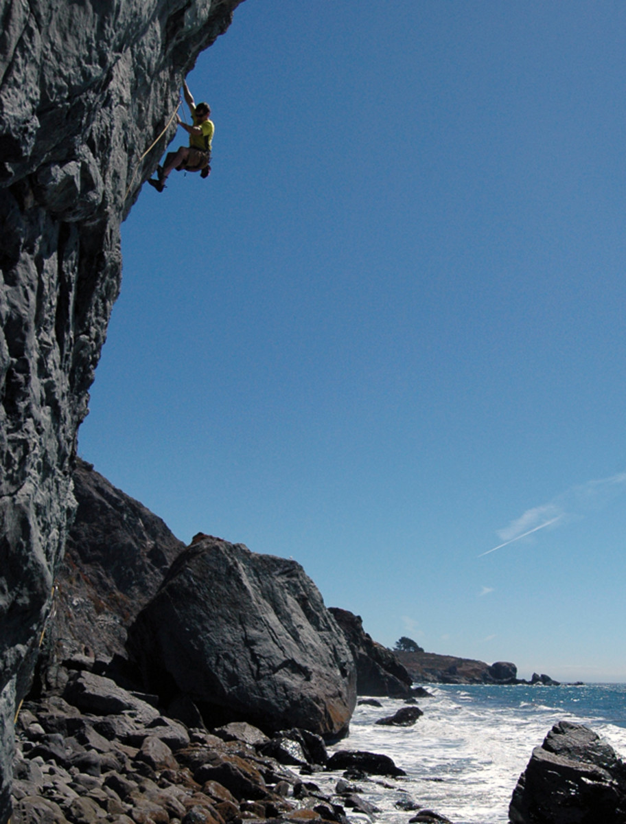 Chris Van Leuven climbing at Mickey's beach