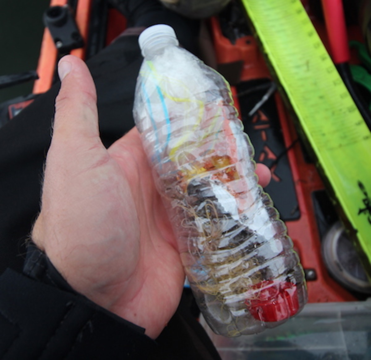 Stuff all those stray wrappers and tag ends of line into a water bottle and keep trash out of the water. Have a reusable water container, grab someone else's trash and put that to use. Photo Jeff Little