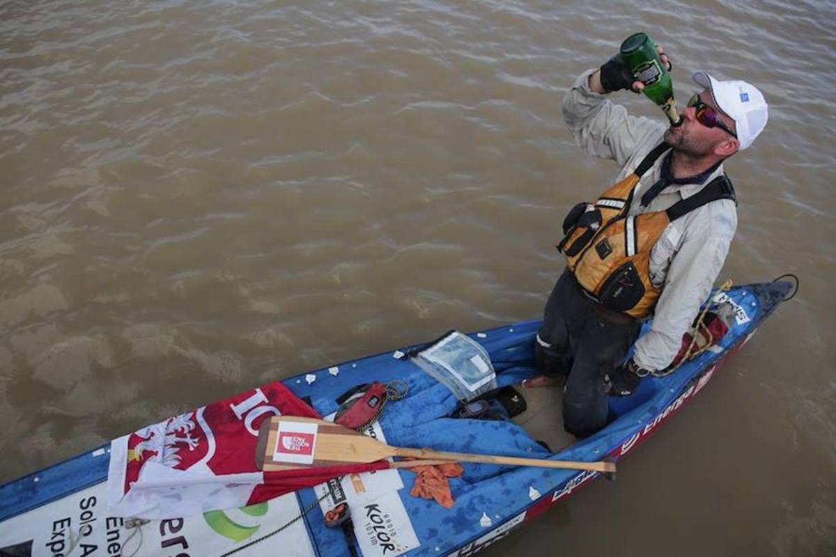 Good while it lasted: Marcin Gienieczko celebrates his Guinness-record Amazon paddle in 2015. Photo via Facebook.