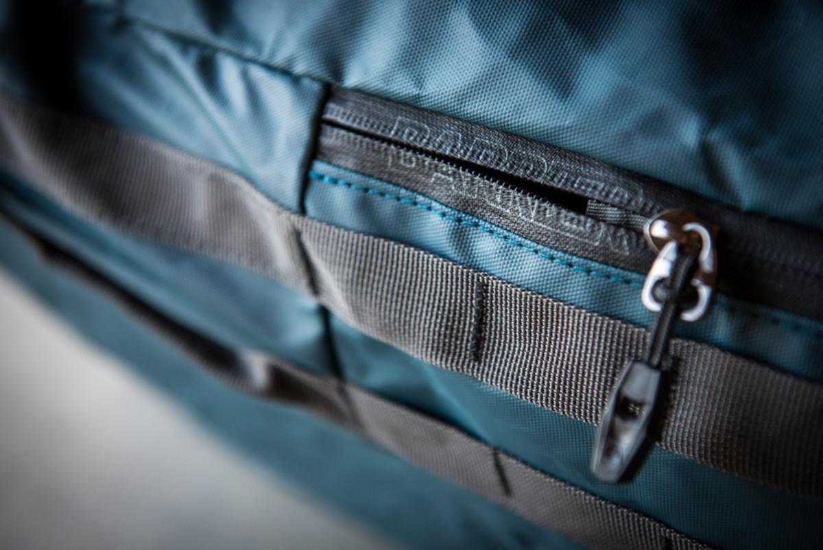 Water-barrier zippered pocket on the outside.
