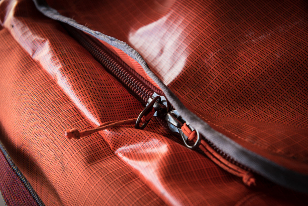 We like the large flag of fabric covering the zipper to provide protection from the elements.
