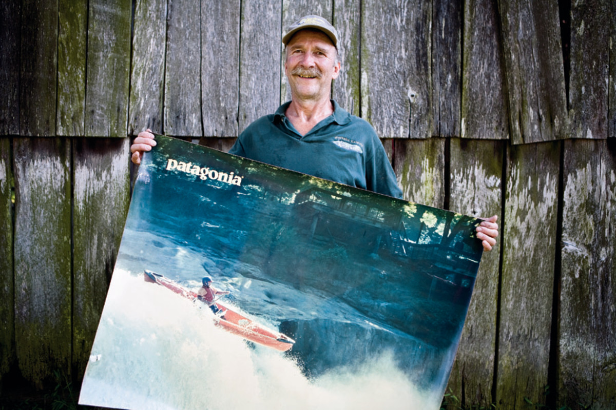 Whitesell poses with his iconic open-boating poster. Portrait by Patrick Cavan Brown.