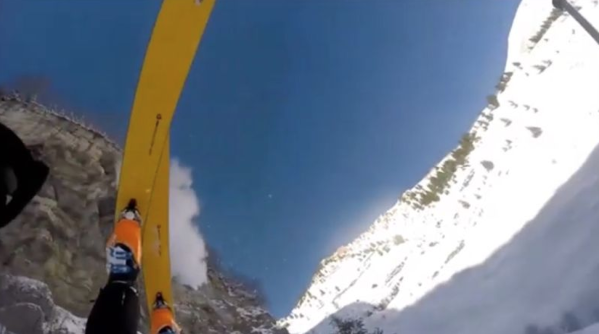 Skier somehow walks away after falling off massive cliff Men's Journal