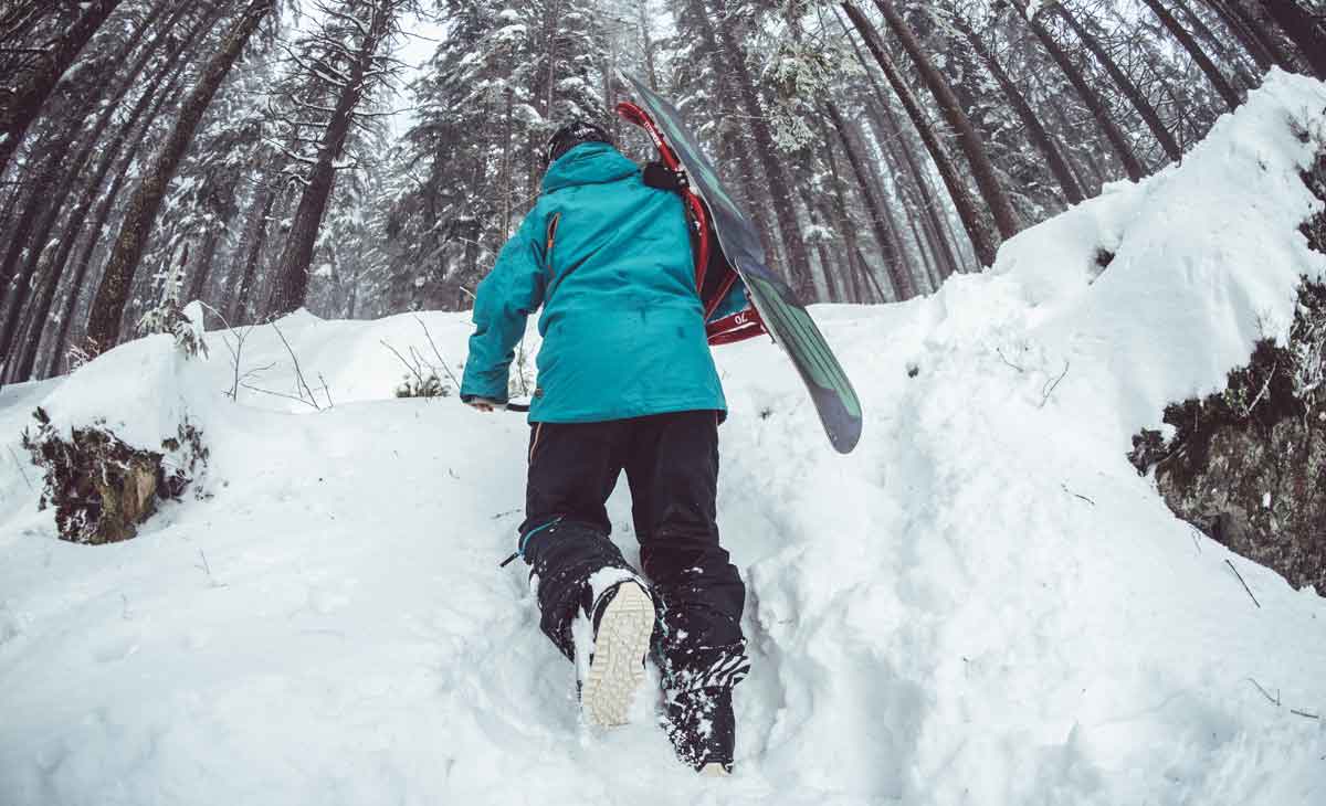 Bootpackin' it to the approach. Photo: Lukas Neasi/Unsplash