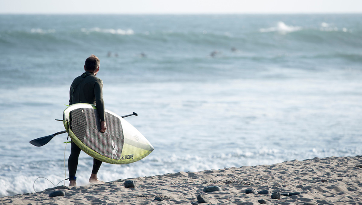 Byron Kurt SUP surfing in San Clemente.