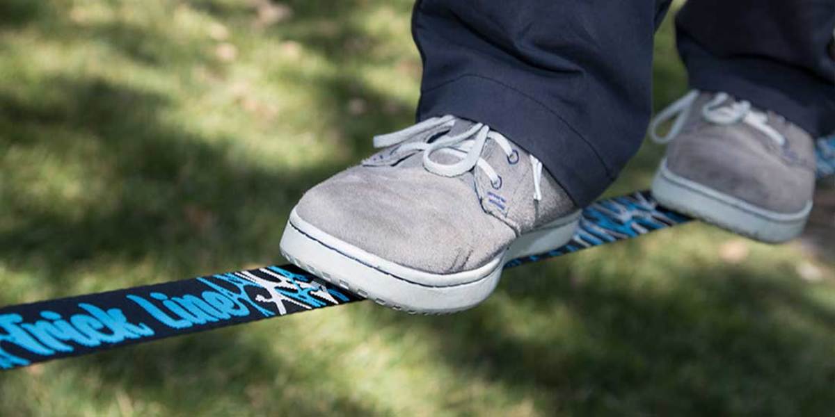 guy's foot on slackline