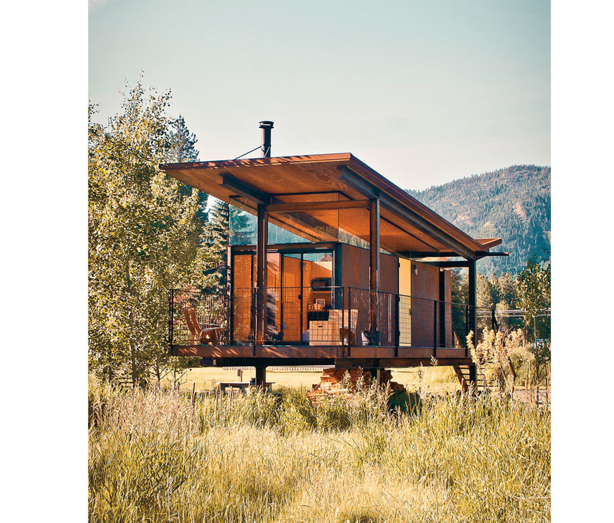Wood and metal cabin in open plain