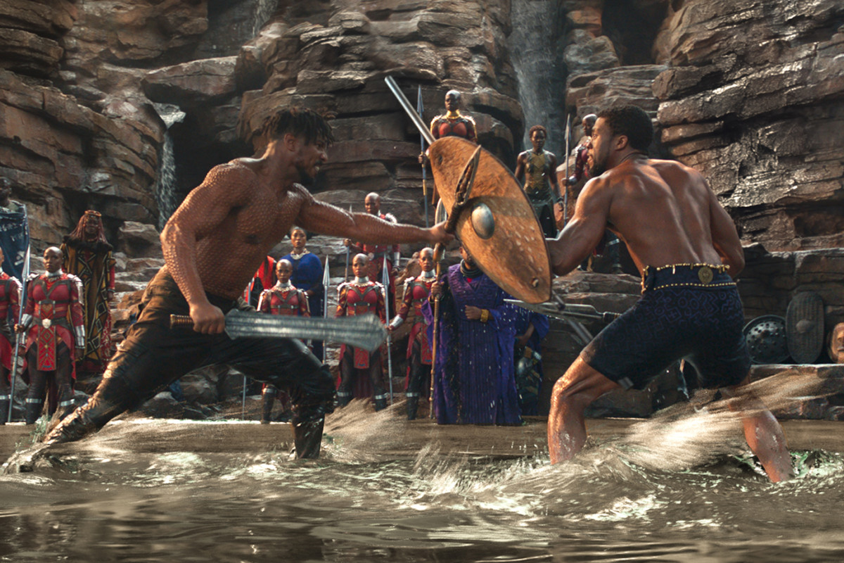 Marvel Studios' BLACK PANTHER..L to R: Erik Killmonger (Michael B. Jordan) and T'Challa/Black Panther (Chadwick Boseman)..Ph: Matt Kennedy..© 2018