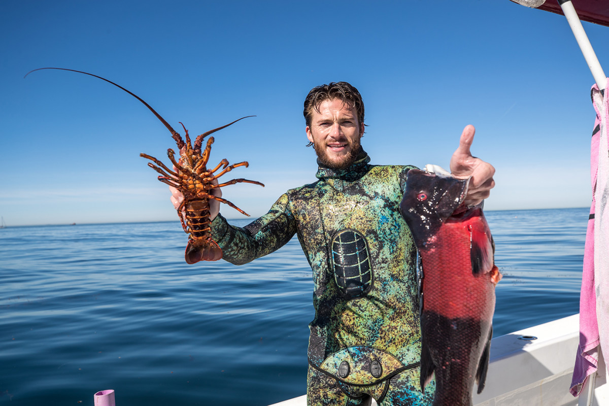 Scott Eastwood with freshly caught lobster and California sheepshead.