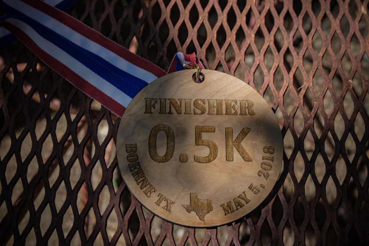 The medal for finshers of the 0.5K race in Boerne, Texas.