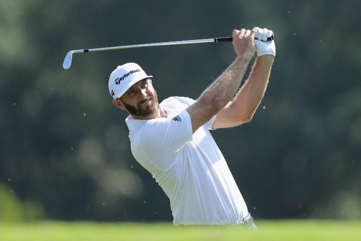 PONTE VEDRA BEACH, FL - MAY 09: Dustin Johnson of the United States plays a shot during practice rounds prior to THE PLAYERS Championship on the Stadium Course at TPC Sawgrass on May 9, 2018 in Ponte Vedra Beach, Florida.