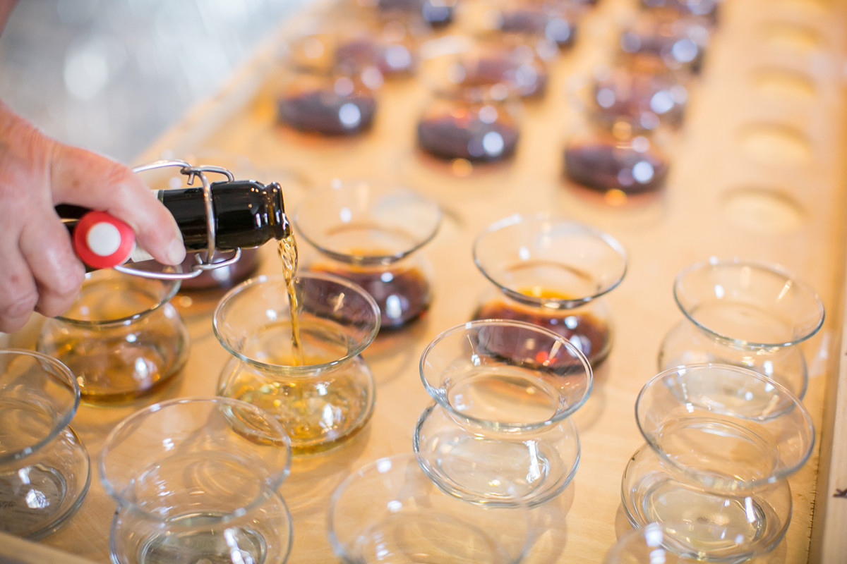 Tasting samples being poured into special glasses at the San Francisco World Spirits Competition.