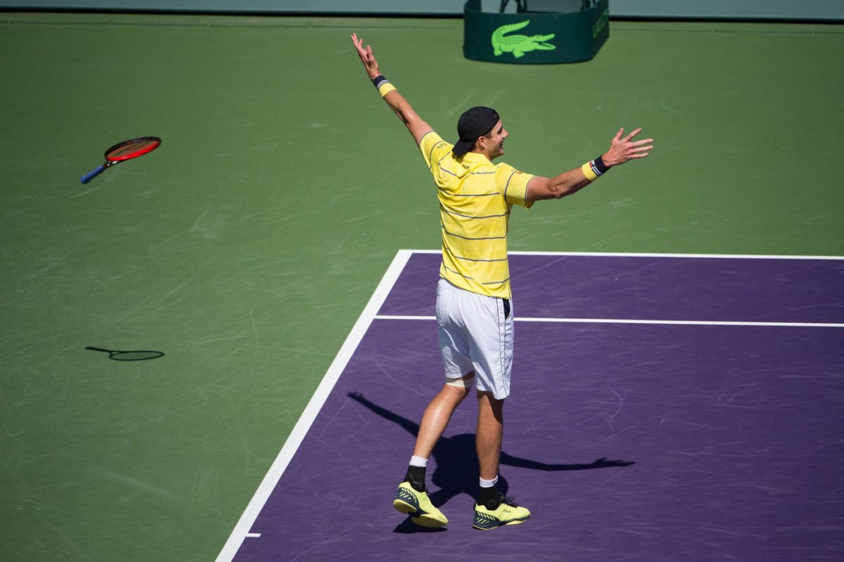 John Isner celebrating on court