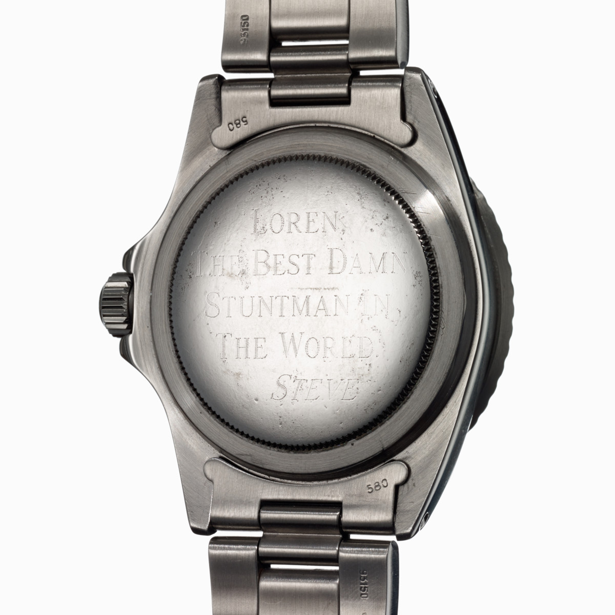 The inscription on a Rolex Submariner that once belonged to Steve McQueen.