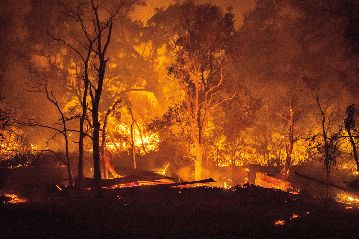 A garage and rental unit burn during the 2017 Atlas Fire near Napa, which destroyed some 51,000 acres