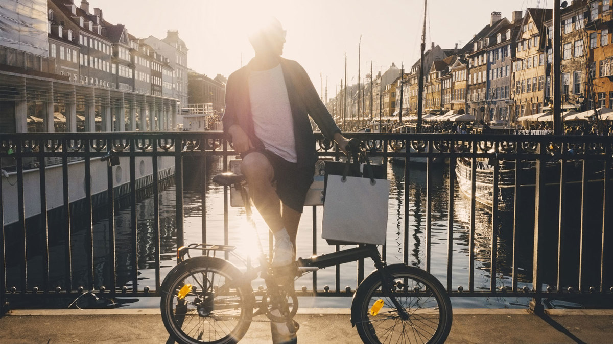Man Standing by Canal in Copenhagen