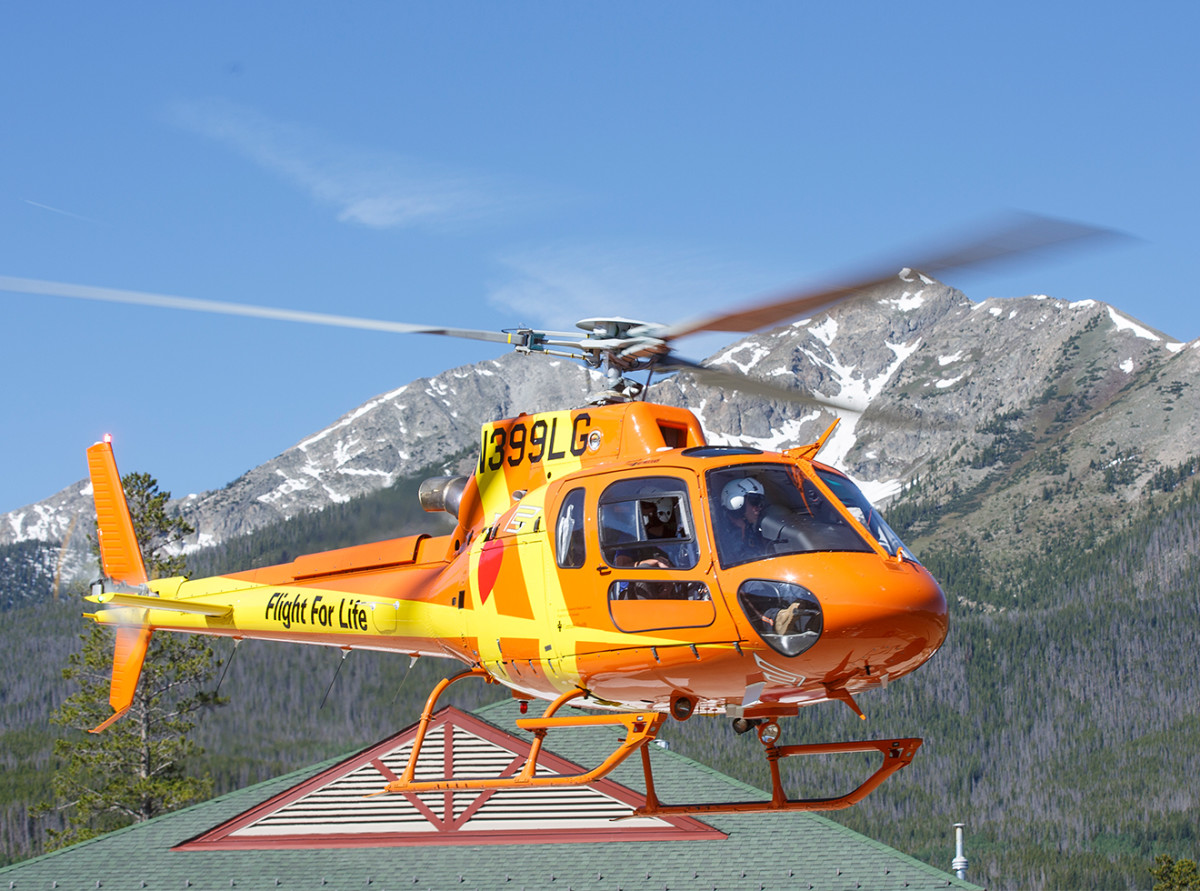 An Airbus AS350 B3e takes off from a helipad in Frisco, Colorado.