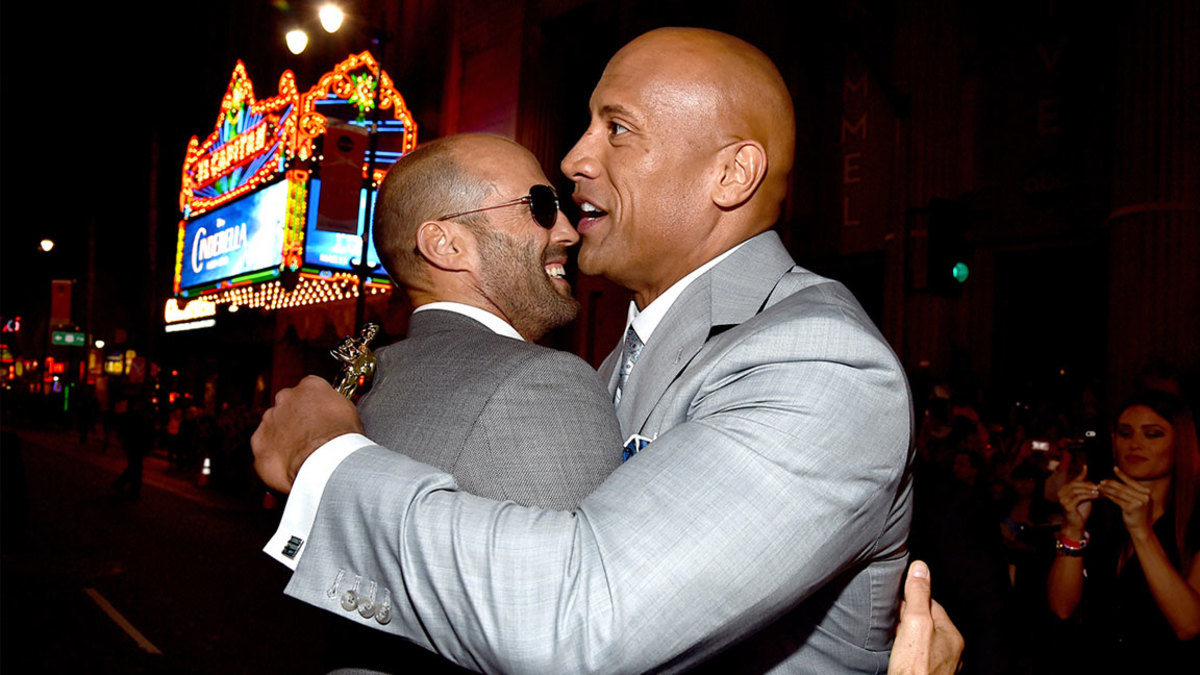 Actors Jason Statham (L) and Dwayne 'The Rock' Johnson attend Universal Pictures' 'Furious 7' premiere at TCL Chinese Theatre on April 1, 2015 in Hollywood, California. (Photo by Alberto E. Rodriguez/Getty Images)