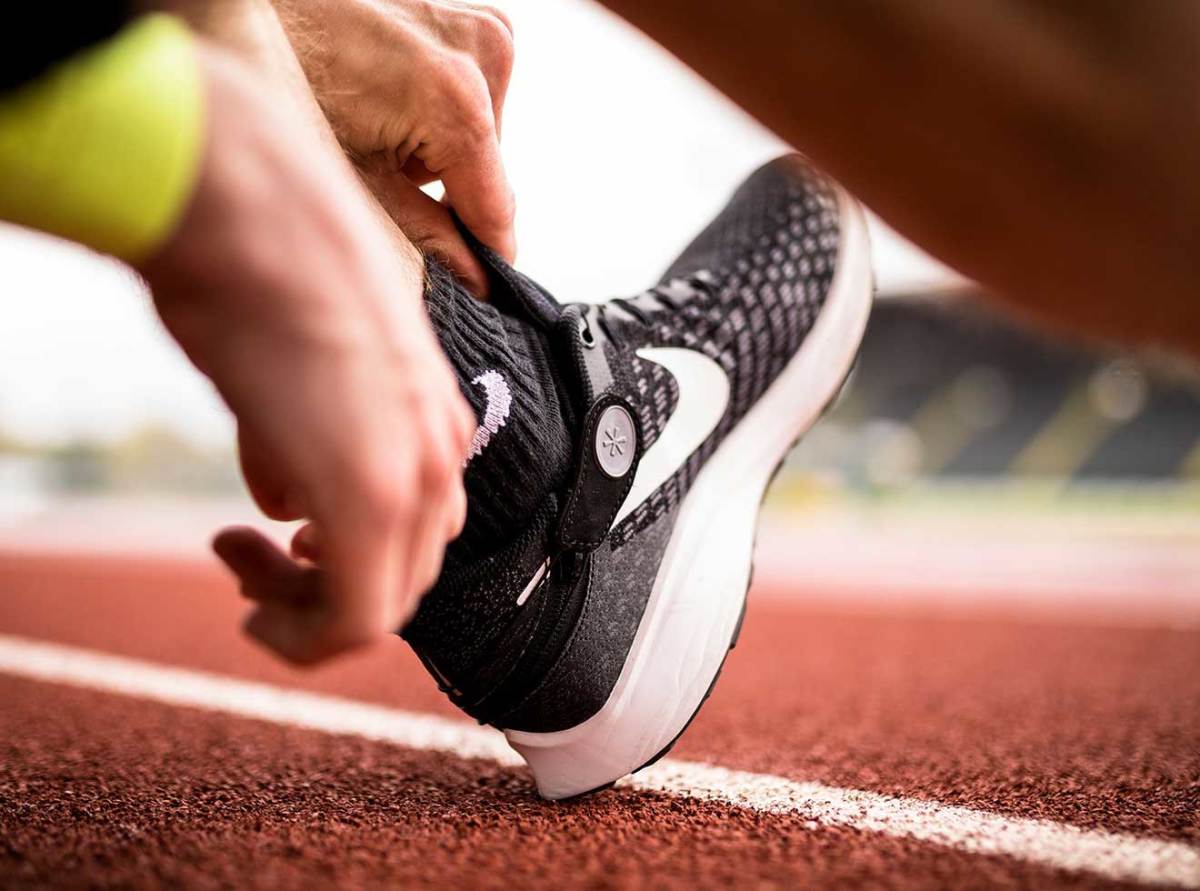 The Nike Air Zoom Pegasus 35 FlyEase swaps laces for a lightweight zipper-and-strap upper