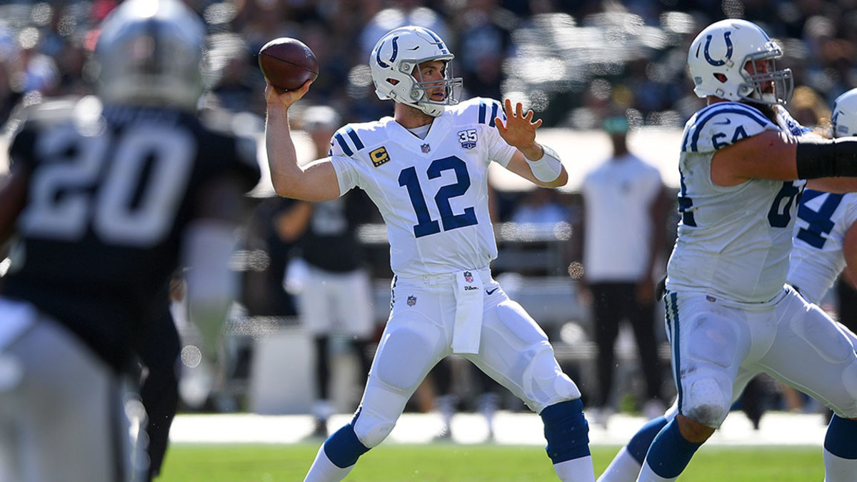 Andrew Luck #12 of the Indianapolis Colts looks ot pass against the Oakland Raiders during the first quarter of their NFL football game at Oakland-Alameda County Coliseum on October 28, 2018 in Oakland, California. (Photo by Thearon W. Henderson/Getty Images)