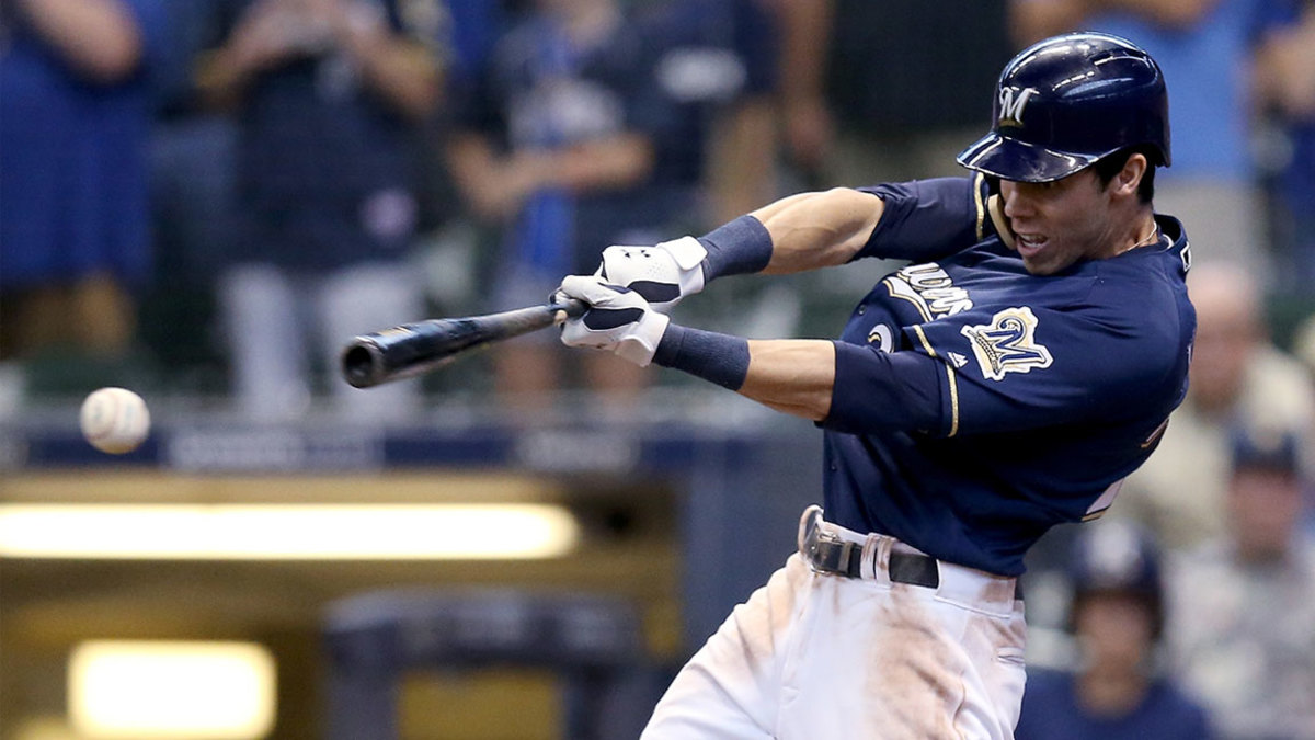 Christian Yelich #22 of the Milwaukee Brewers hits a fielder's choice to beat the Chicago Cubs 4-3 at Miller Park on September 3, 2018 in Milwaukee, Wisconsin. (Photo by Dylan Buell/Getty Images)